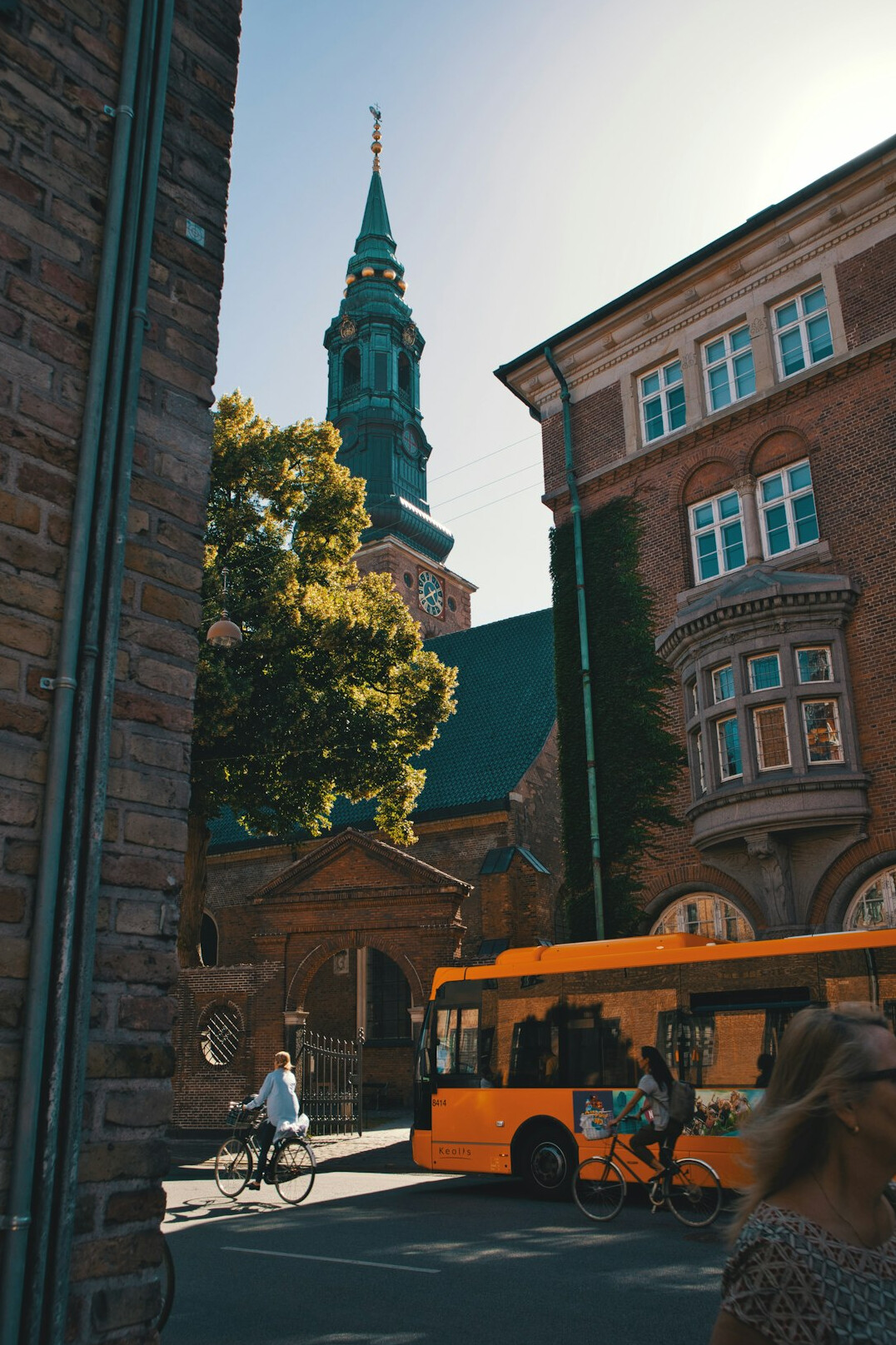Bicycle leaning against a small Danish village church