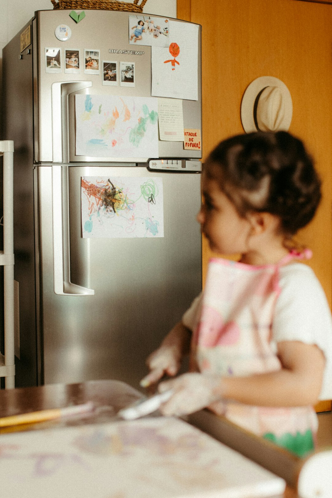 young artist painting at home